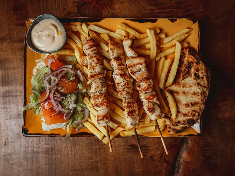Chicken skewers with chips and dip