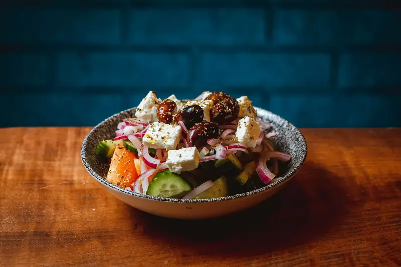 Greek salad with a slab of feta