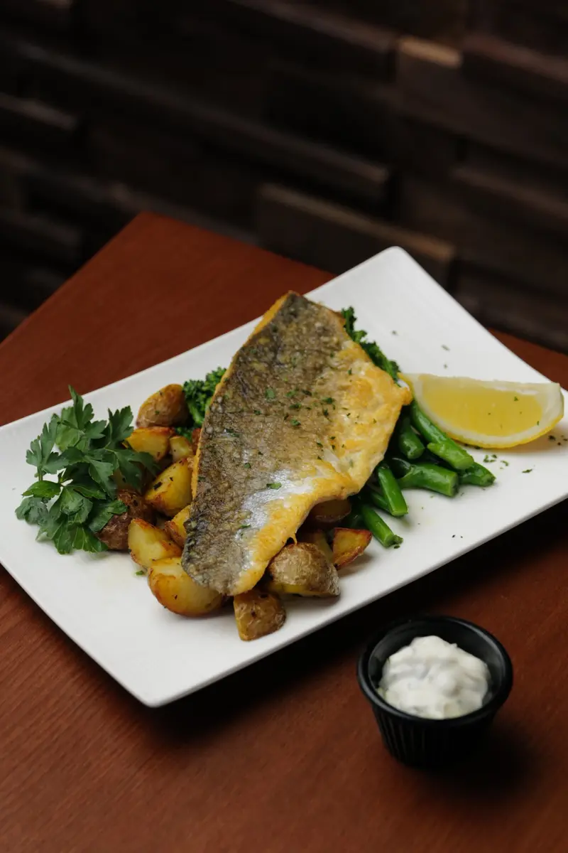 Grilled sea bass with potatoes and green beans