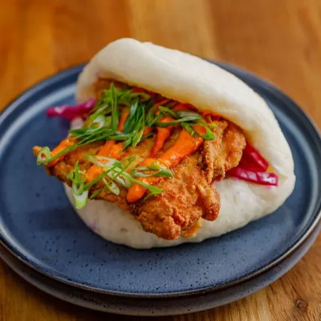 Fried chicken bao with hot sauce